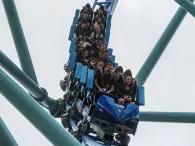Guests riding Electric Eel roller coaster at SeaWorld San Diego