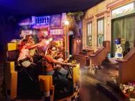 Guests enjoying Europe's first Sesame Street® dark ride - Street Mission - at PortAventura theme park