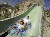 Father and son riding Stinger at Aquaventure