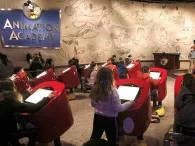 Kids drawing at Animation Academy, Disneyland Paris