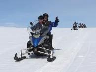 couple-on-snowmobile
