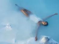 woman-floating-in-pool