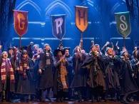 children-on-stage-in-house-colours
