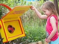 child-interacting-with-garden