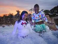 Girls in wave pool - Disney H2O Glow Nights at Disney’s Typhoon Lagoon