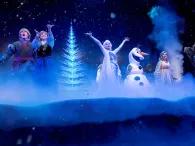 For the First Time in Forever: A Frozen Sing-Along Celebration Elsa, Anna, Kristoff and Olaf singing on stage