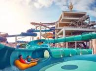 Medusa's Lair Riders twisting and turning on Medusa’s Lair waterslide at Atlantis Aquaventure Waterpark Dubai