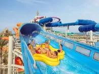 Shockwave Five happy riders on Shockwave water ride at Atlantis Aquaventure Waterpark