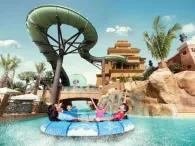 Zoomerango Excited riders on Zoomerango slide at Atlantis Aquaventure Waterpark