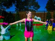 Guest playing at DUPLO® Splash & Play, LEGOLAND Florida