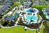Aerial view of the water slides and large communal pools at Encore Club at Reunion