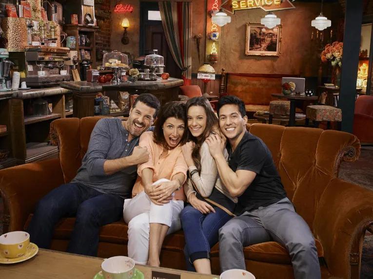 Guests sitting on the Friends sofa at Warner Bros. Studio Tour Hollywood