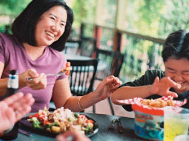 Family enjoying a meal at SeaWorld Orlando