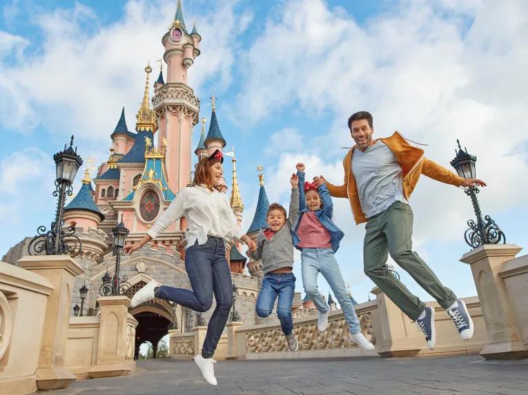 Family in front of Sleeping Beauty Castle at Disneyland Paris