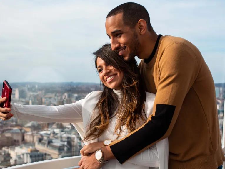 Couple riding on the London Eye