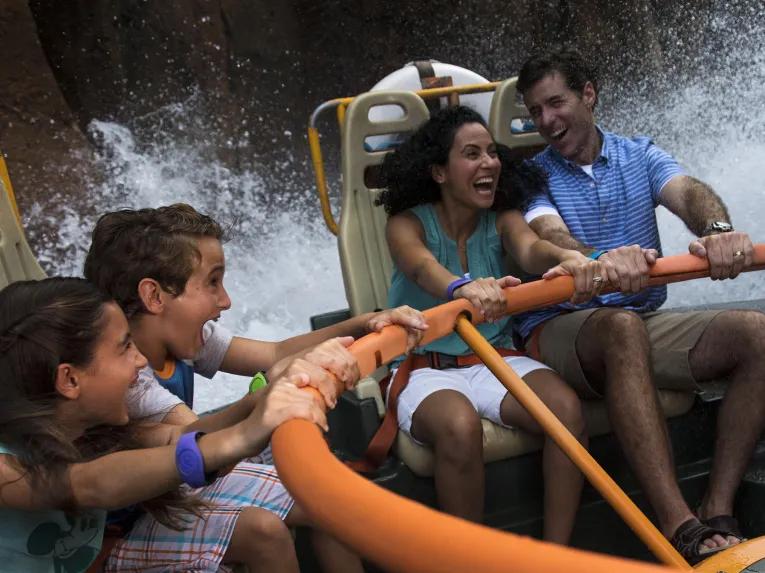 Guests getting wet on Kali River Rapids at Disney's Animal Kingdom Theme Park