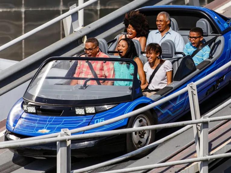 Family riding Test Track at Epcot