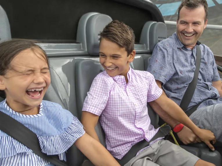 Family riding on Test Track at Epcot