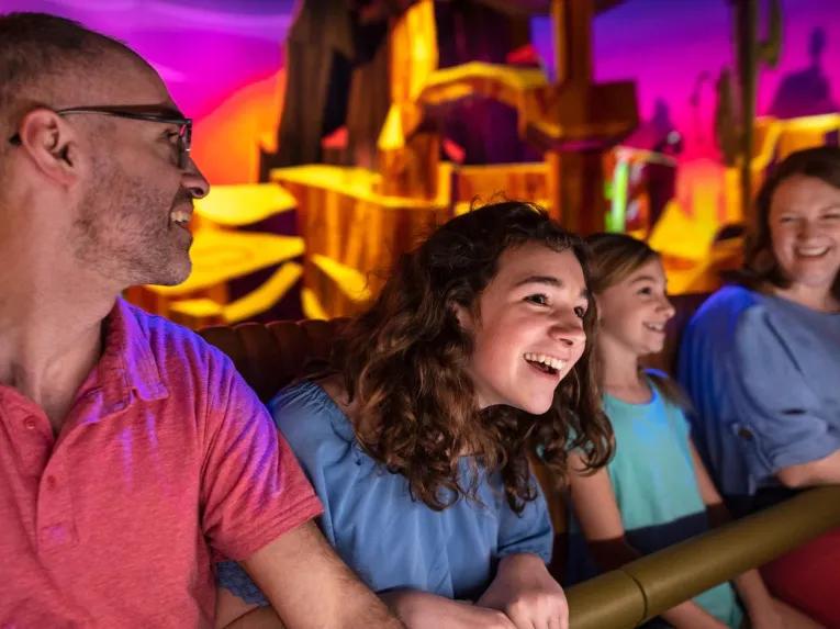 Guests enjoying Mickey & Minnie's Runaway Railway at Disney's Hollywood Studios