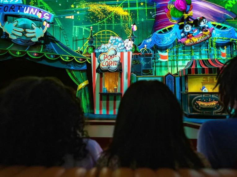 Guests enjoying Mickey & Minnie's Runaway Railway at Disney's Hollywood Studios