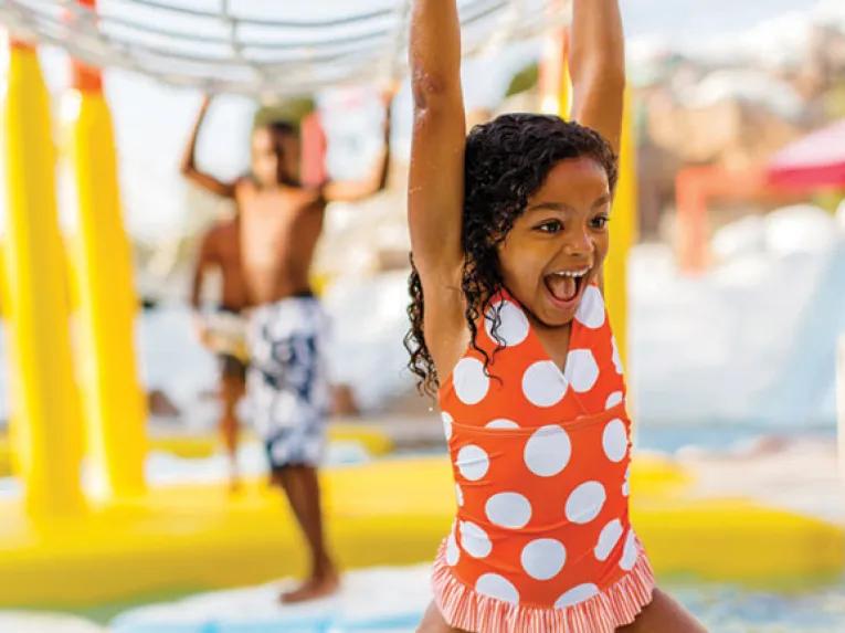 Girl playing in Ski Patrol Training Camp at Disney's Blizzard Beach