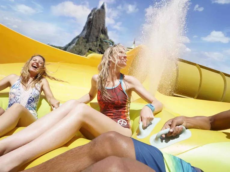 Guests on Puihi of Maku Puihi Round Raft Ride at Universal's Volcano Bay Water Theme Park