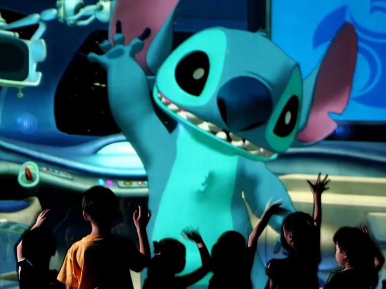 Kids meeting Stich at Stitch Live in Disneyland Paris