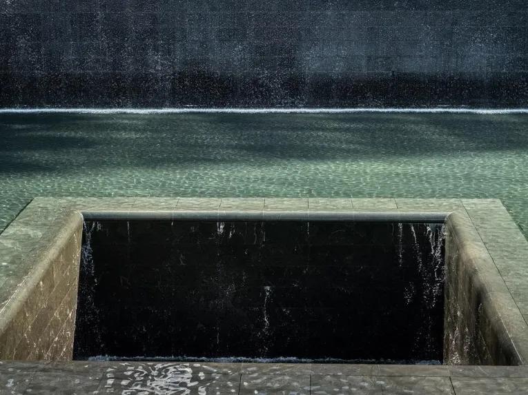 Manmade waterfall set within the footprint of the Twin Towers outside the 9/11 Memorial Museum