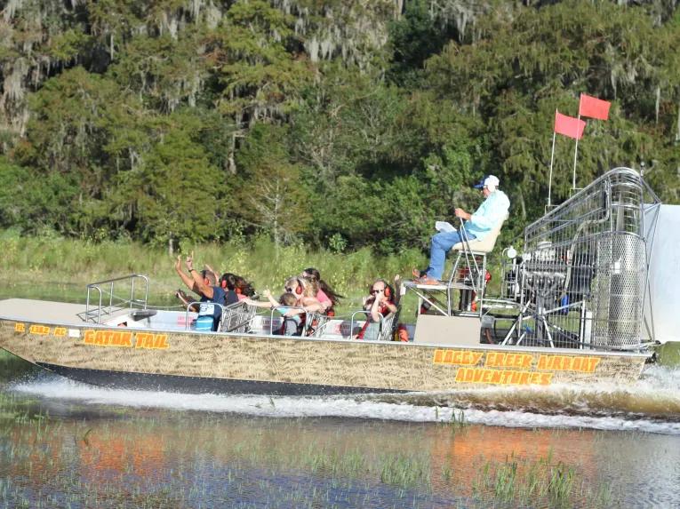Guests enjoying an airboat ride at Boggy Creek Orlando