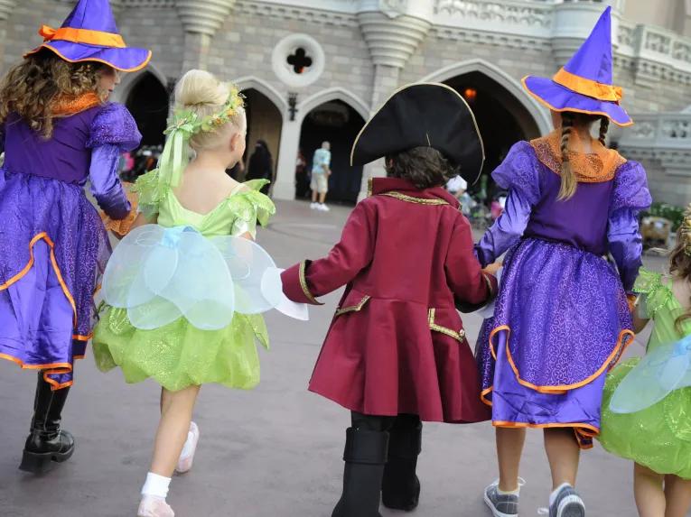 Kids in Halloween costumes at Disney After Hours Boo Bash at Magic Kingdom Park