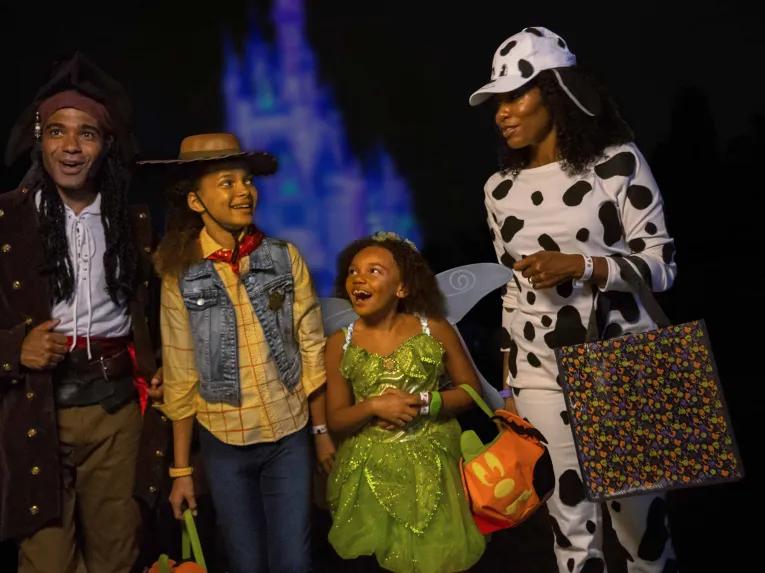 Family enjoying Disney After Hours Boo Bash at Magic Kingdom Park