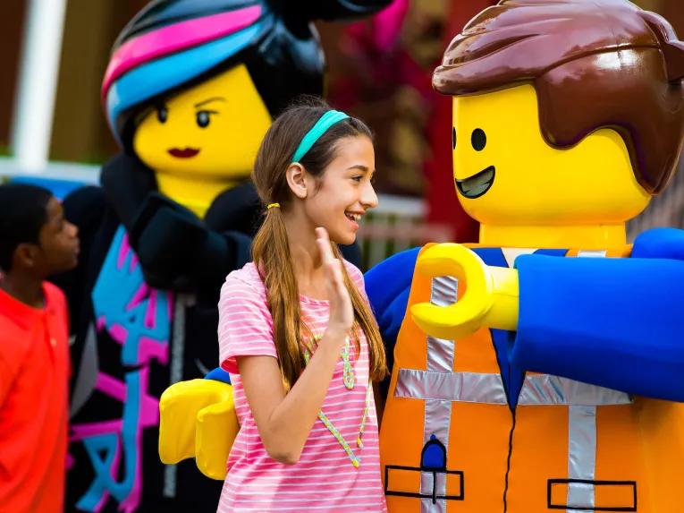 Girl meeting Emmet at LEGOLAND Florida