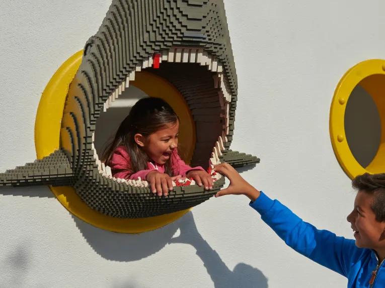 Girl inside a LEGO Shark at at LEGOLAND Windsor