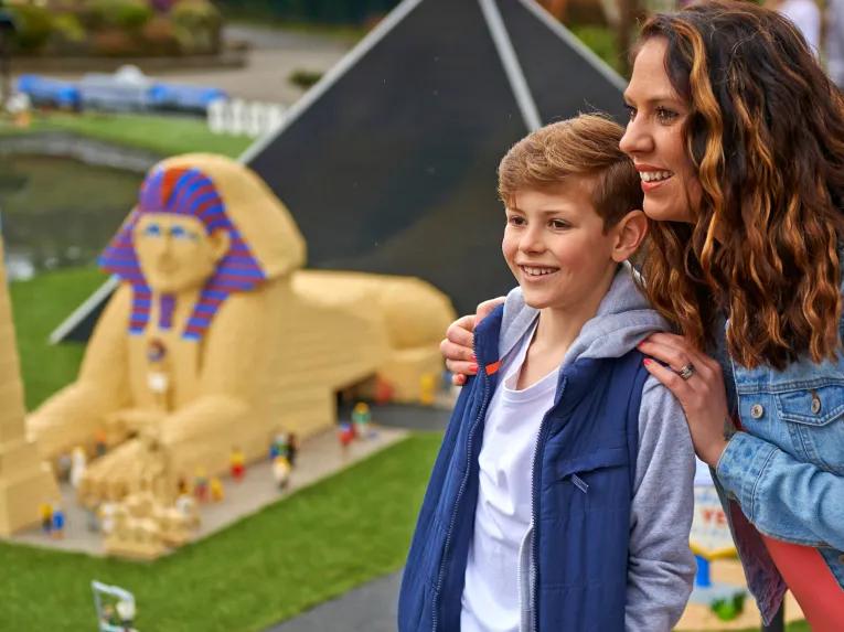 Mother and son exploring Miniland at the LEGOLAND Windsor