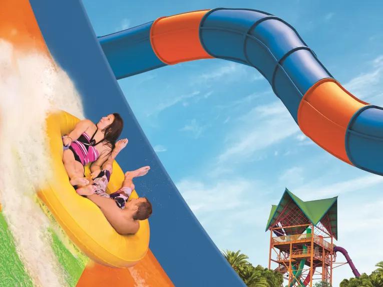 Couple riding KareKare Curl at Aquatica Orlando