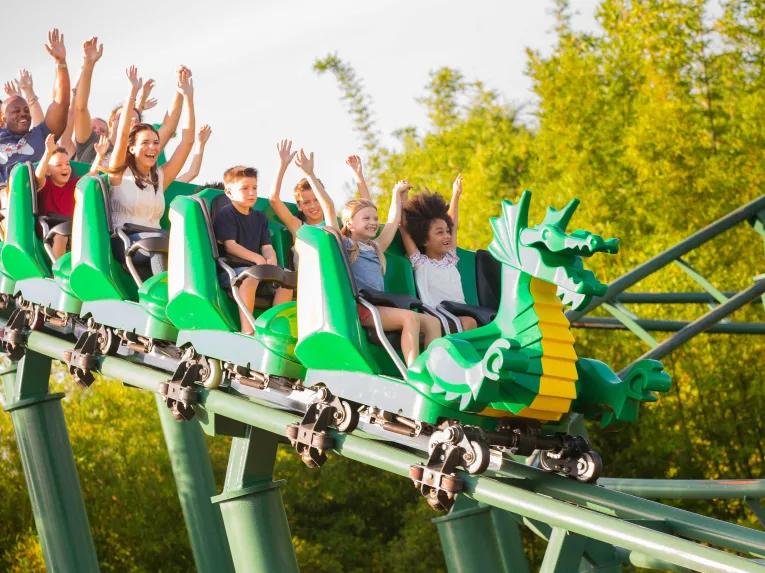 Guests enjoying The Dragon coaster at LEGOLAND Florida