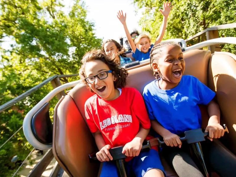 Kids enjoying Coastersaurus ride at LEGOLAND Florida