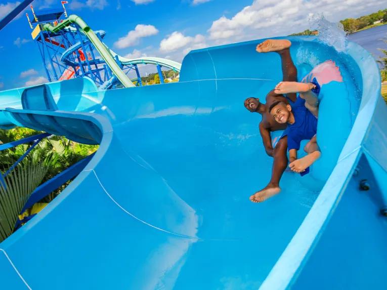 Father and son riding a waterslide at LEGOLAND Florida Water Park