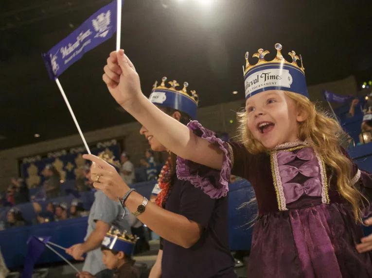 Fans cheering at Medieval Times Orlando Dinner Show & Tournament
