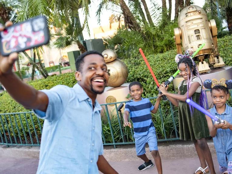Family taking a selfie at Disney's Hollywood Studios