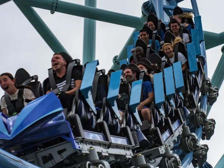 Guests riding Electric Eel roller coaster at SeaWorld San Diego in California