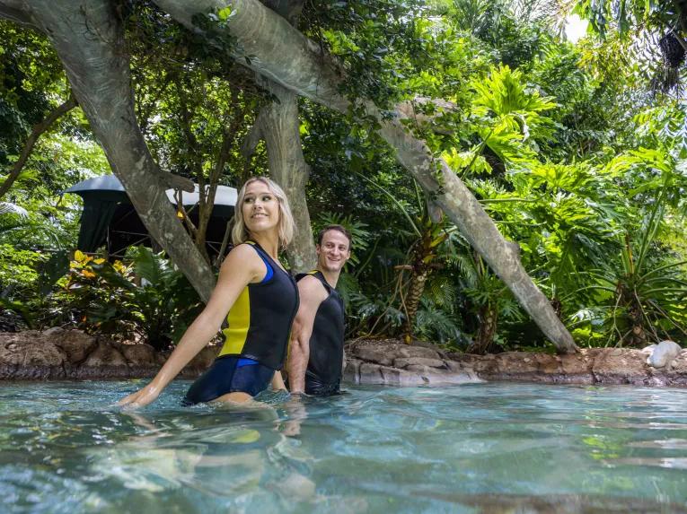 Guests exploring Freshwater Oasis at Discovery Cove