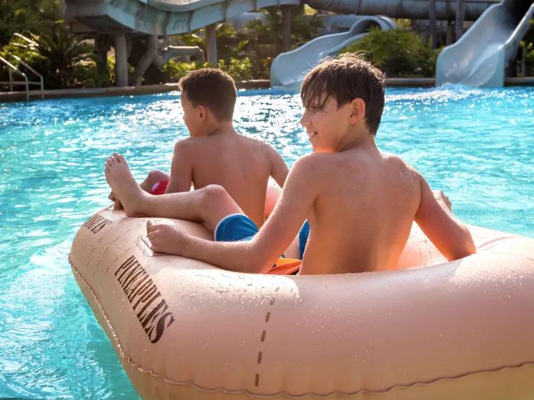 Guests on Crush ‘n’ Gusher, Disney’s Typhoon Lagoon Water Park