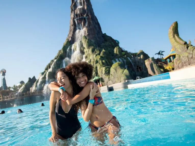 Girls playing in the wave pool at Universal's Volcano Bay