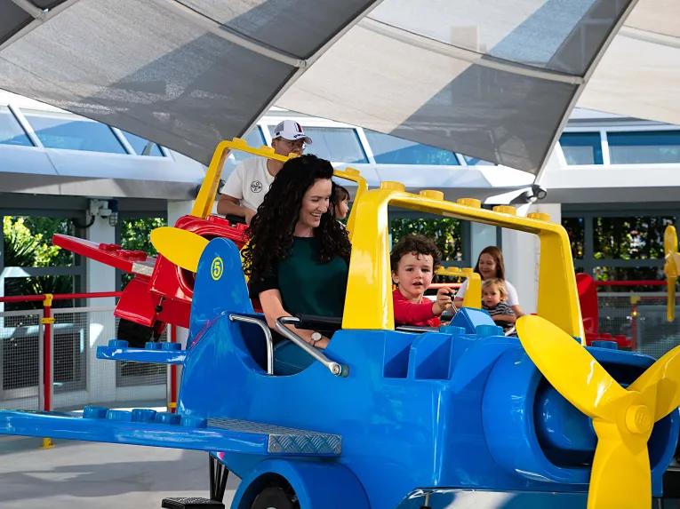 Family riding City Airport at LEGOLAND Dubai