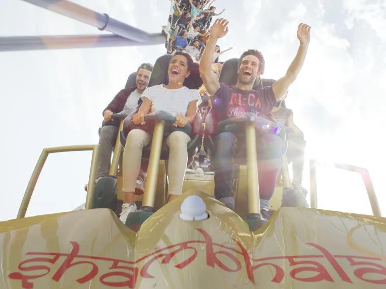 Guests riding Shambhala at PortAventura theme park