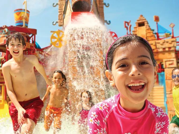 Kids playing in Splashers Mountain at Aquaventure Dubai