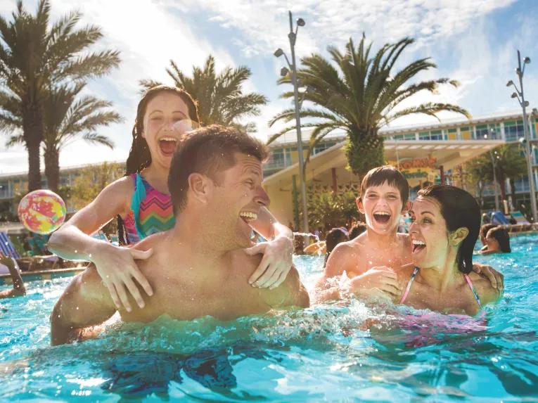 Guests in pool at Universal’s Cabana Bay Beach Resort