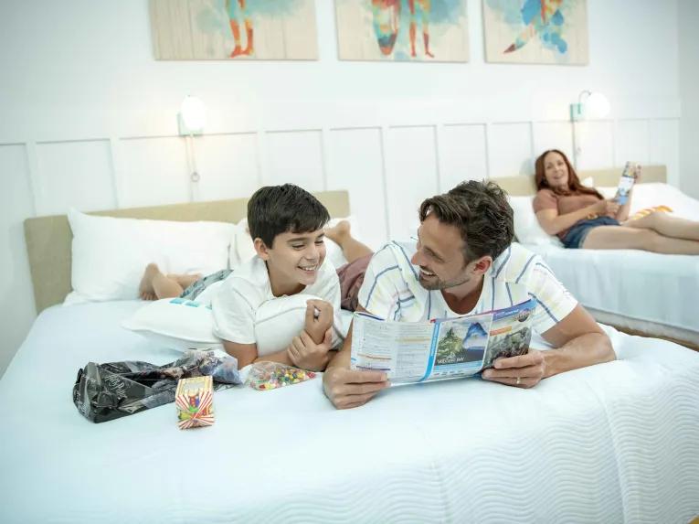 Family in standard room at Universal's Endless Summer Resort – Surfside Inn and Suites