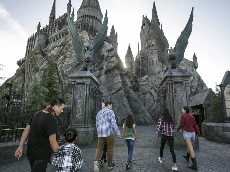 Guests in front of Hogwarts castle at Universal Studios Hollywood